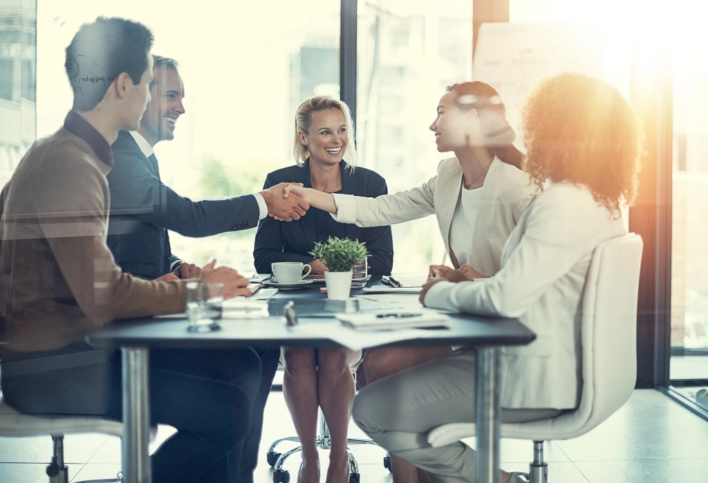 Image of a group of people in a successful meeting
