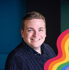Greg Clarks Profile Picture with a pride flag