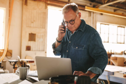 Man looking at his laptop