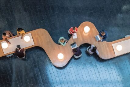 Employees working on laptops