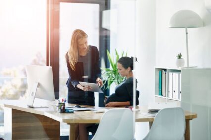 Pregnant woman working in an office