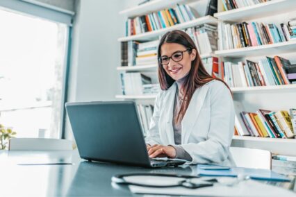 Woman looking at her laptop